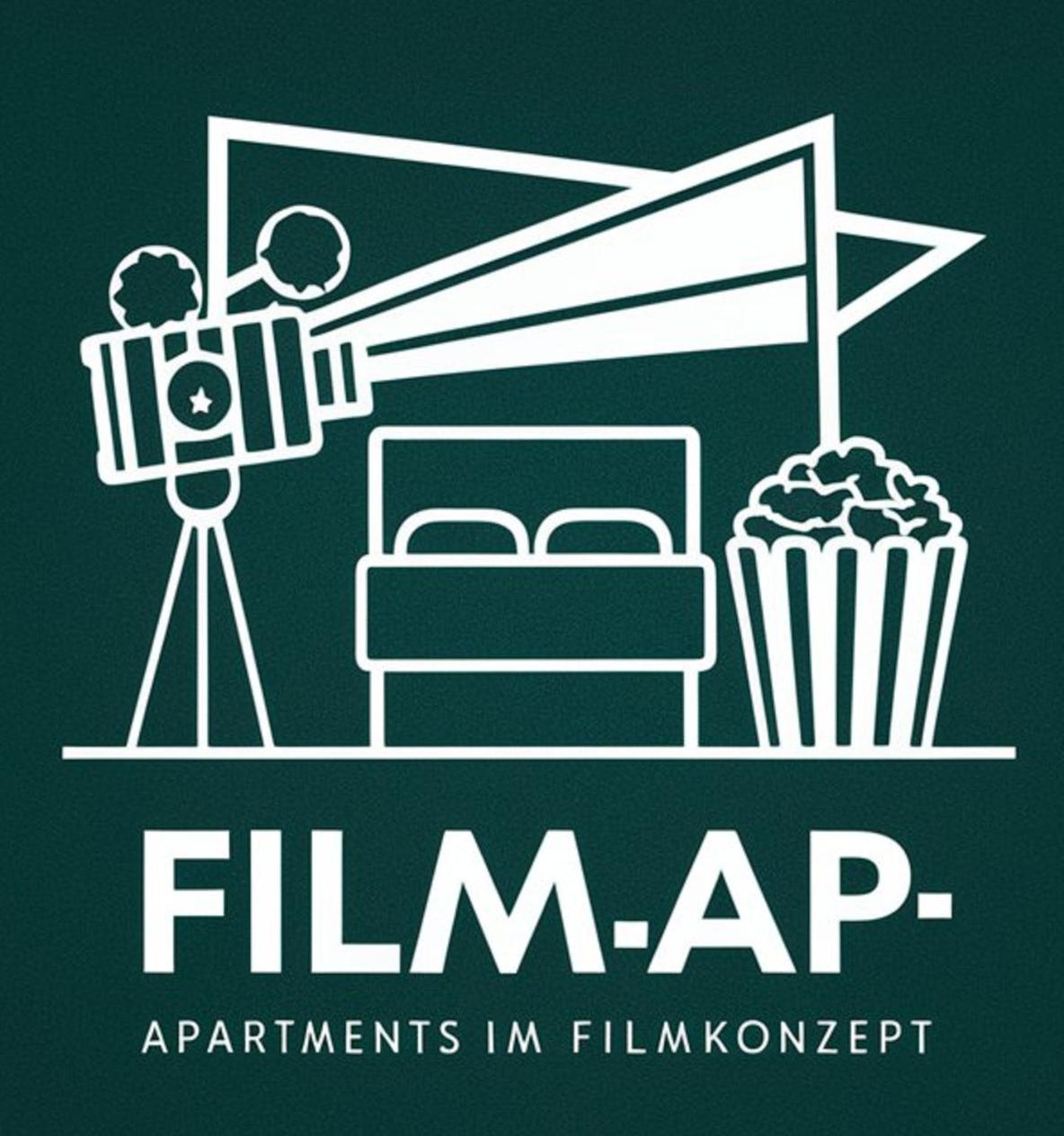 Filmap-apartments-zentrale Lage-boxspringbett-beamer-popcorn-gratis Parkplatz Apartment